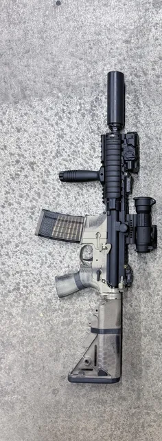 Centurion C4 Quad 8.5-inch 300 BLK on a Geissele Lower
