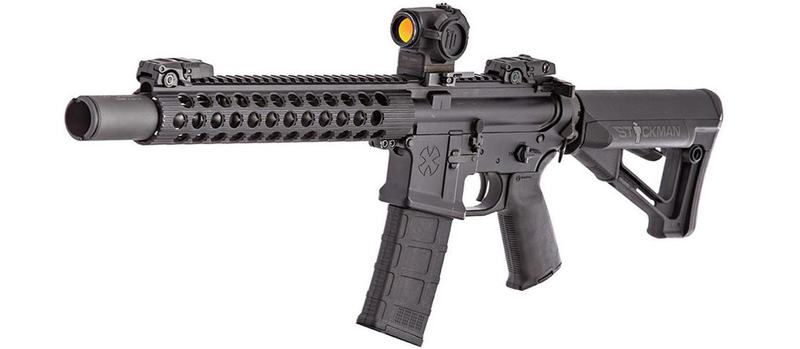 Short-barreled AR-15 rifle with a suppressor, red dot and collapsible stock